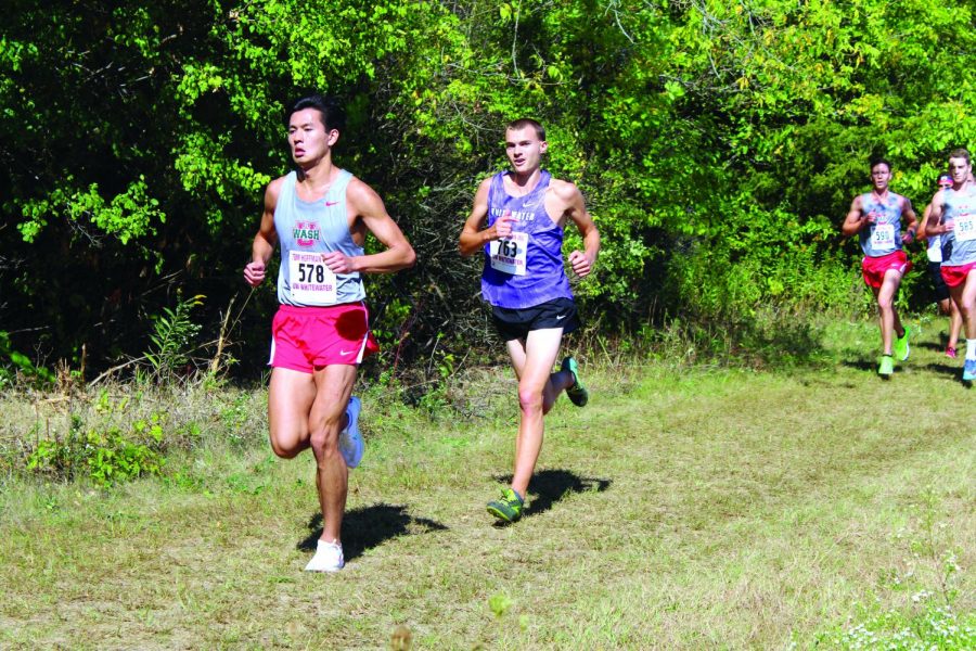 Senior David Fassbender looks to overtake other runners during the Tom Hoffman Invitational in Whitewater on Sept. 18, 2021.