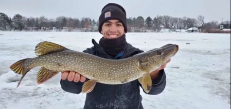 Senior Grant Stanioch hoisting up his Northern Pike