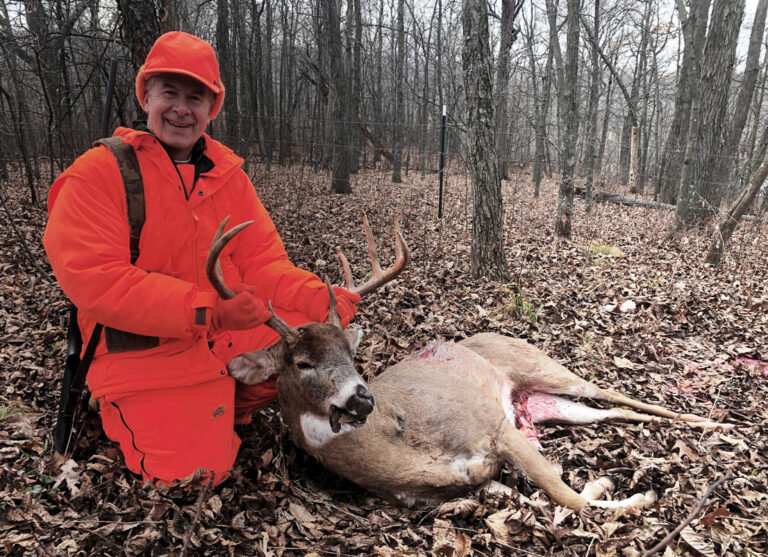 Chris Hardie and his 9-point buck and an 18-inch antler spread shot opening day, Nov. 20, 2021. (Ross Hardie photo)
