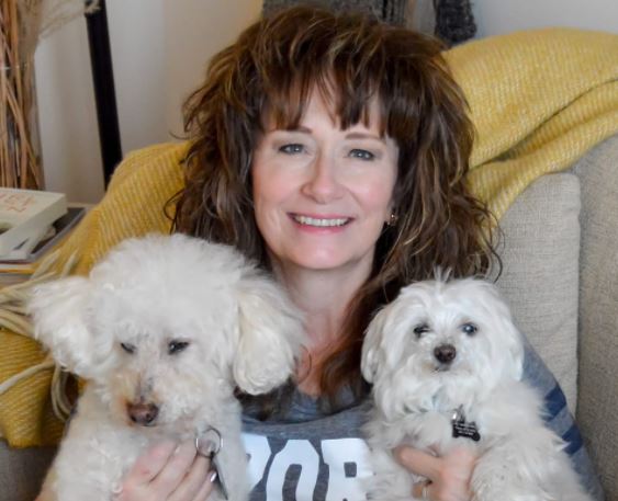 Jo Barrow with her two rescue dogs, miniature poodle, Rizzo (left) and maltese, Niko (right) February, 2022