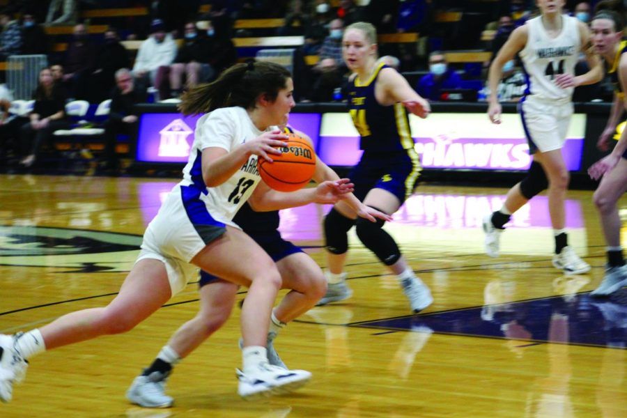 Freshman guard Kacie Carollo makes a drive toward the basket during their home game against the University of Wisconsin - Stevens Point Jan. 26, 2022.