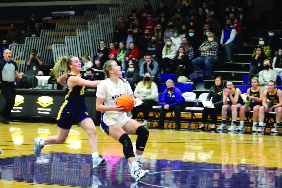 Junior forward Aleah Grundahl stops to make a score a jump shot during their home game against the University of Wisconsin - Stevens Point Jan. 26, 2022.
