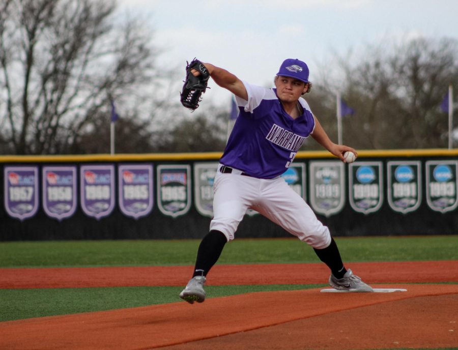During the first game of the doubleheader against UW-Oshkosh, Freshman Pitcher Donovan Brandl (34) throws the ball to home plate, Friday April 9, 2021.
