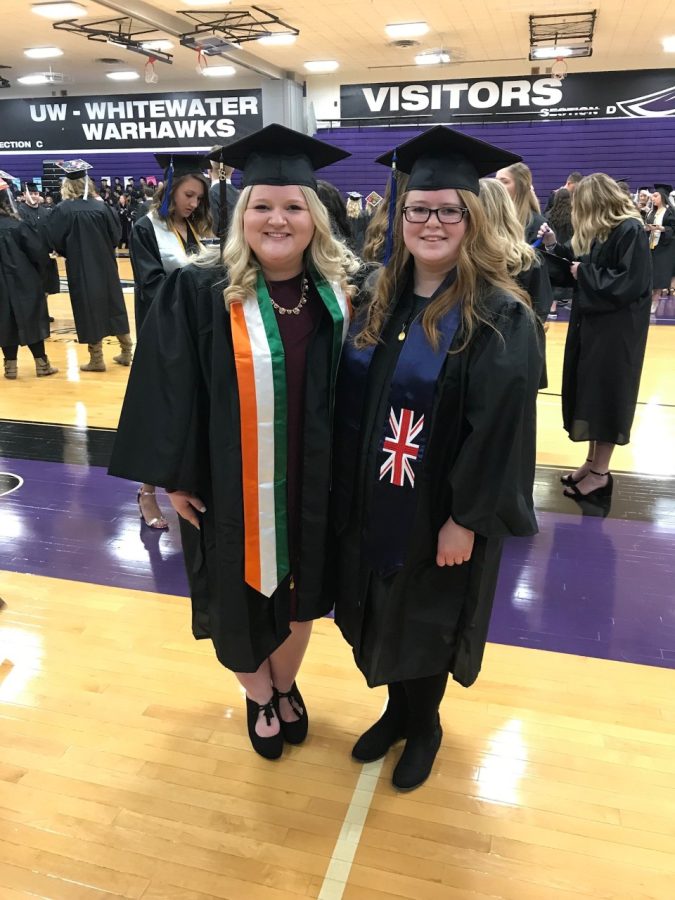 Alumna Kelly Hedmark (right) and her friend Leah Koppelmann pose after their graduation from UW-Whitewater.