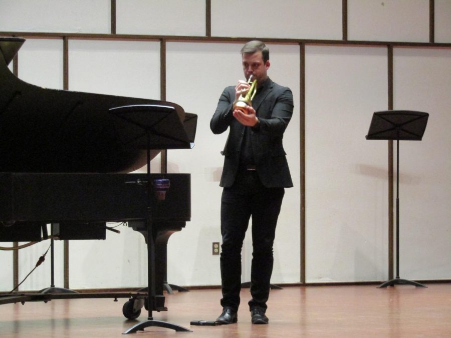 UW-Whitewater’s Dr. Matthew Onstad is seen here performing Noctilucent composed by Angela Elizabeth Slater at the Trumpet Studio Recital in the Light Recital Hall Mar. 18, 2022.