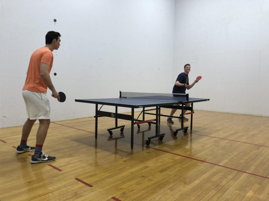 Two members of the club begin an intense table tennis match