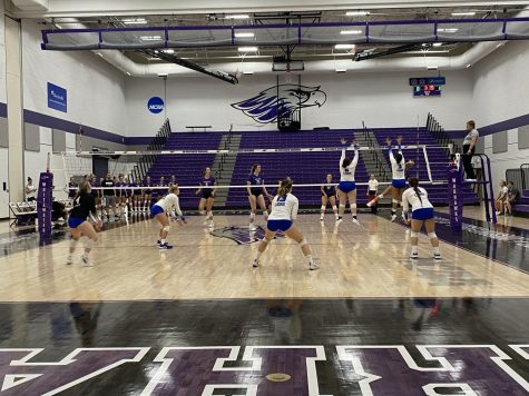 Volleyball team serving in a game against Simpson (OH) on Saturday, September 3rd 2022