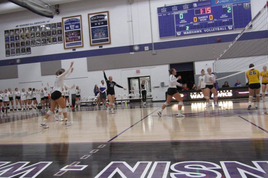 UW-Whitewater Warhawk volleyball players celebrate a point won against UW-Stevens Point Sept. 21, 2022.