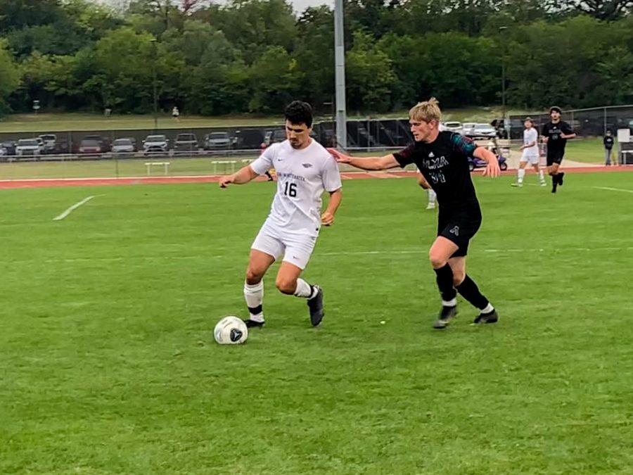Dominic+Mudlaff%2C+Sophomore%2C+from+Muskego%2C+WI+steals+the+soccer+ball+from+the+Alma+player%2C+at+the+Whitewater+vs+Alma+soccer+game%2C+at+Fiskum+Field.