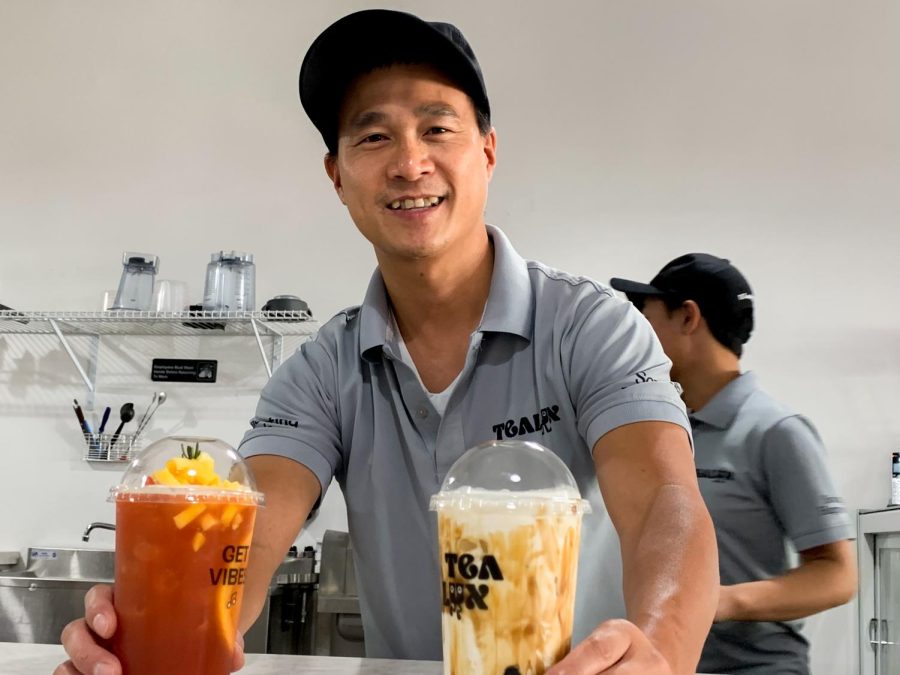 The+owner+at+Whitewater%E2%80%99s+Tealux%2C+Binh+Nguyen%2C+helps+hand+out+a+fruit+boba+tea%2C+and+a+classic+brown+sugar+boba+to+customers.+Binh+is+so+happy+to+have+such+wonderful+customers%2C+and+to+be+able+to+provide+a+boba+shop+locally.
