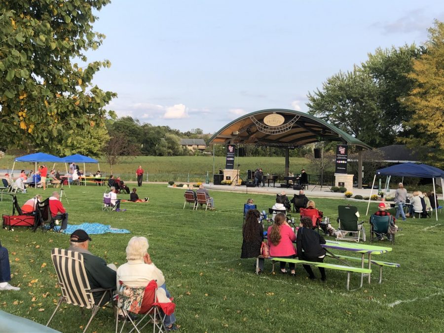 Attendees enjoy a musical performance at the opening of the Frawley Family Cravath Lakefront Amphitheater Thursday, Sept. 17.