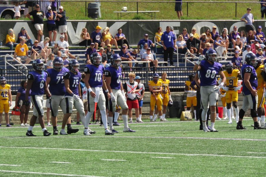 UW-Whitewater quarterback Evan Lewandowski (#10), Steven Hein (#17), Jaylon Edmonson (#6), Nathan Miller (#72),  Zach Sherman (#81), and Michael Coates (#88), are seen here walking back to the line of scrimmage after the previous play against Mary Hardin-Baylor (Texas) Sept. 10 2022.
