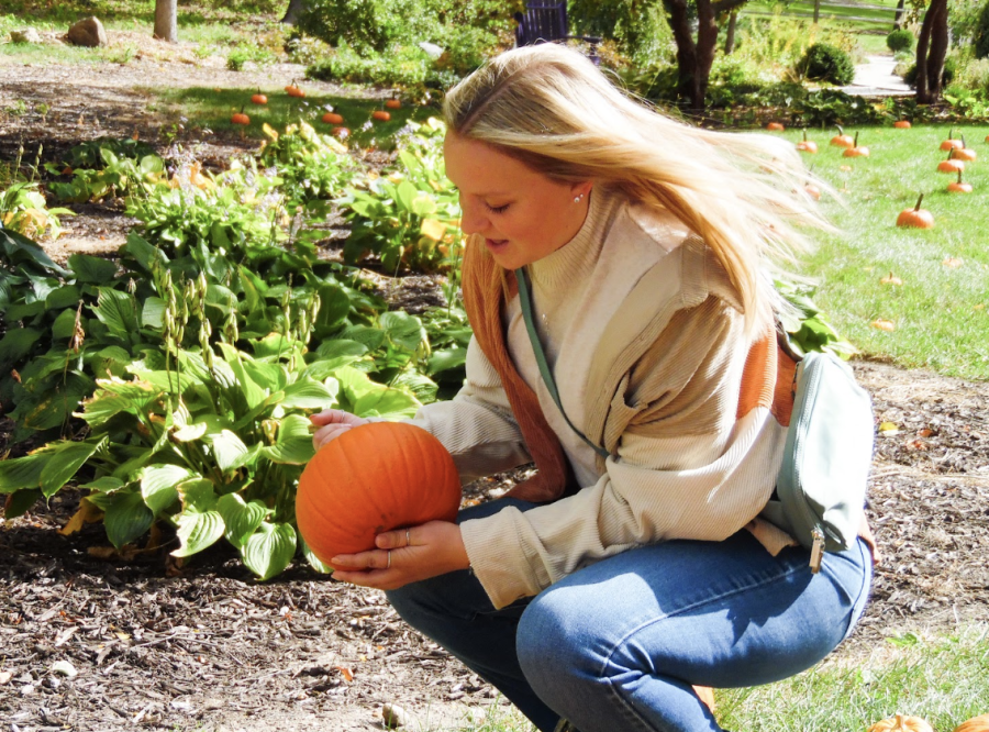 UW-Whitewater+elementary+education+major+Klair+Fortmann%2C+finds+the+perfect+pumpkin+in+the+patch.