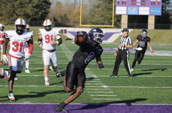 Sophomore Running Back Tamir Thomas scores a touchdown in the football game against UW-River Falls, Oct. 29th, 2022.
