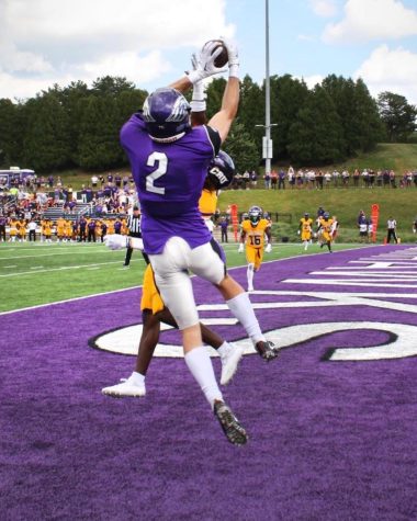 #2 Tommy Coates jumps and catches a game winning touchdown pass over a defender in the Warhawk football victory over then top ranked Mary Hardin-Baylor in Perkins Stadium on September 10, 2022.
