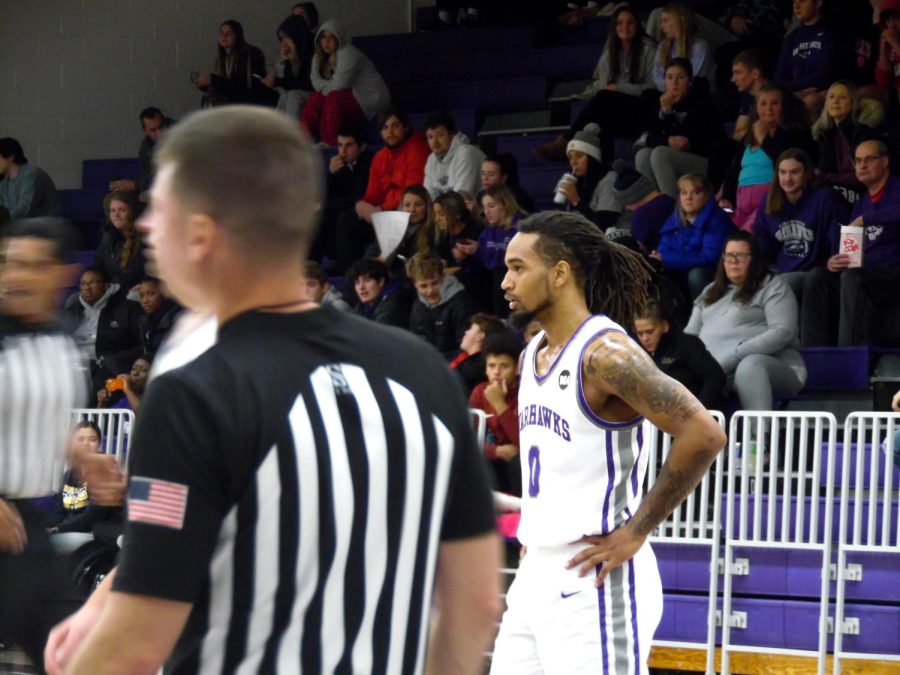 UW-Whitewater player number zero, Elijah Lambert, gets ready to play on defense, at the game versus North Central College, at the Williams Center.
