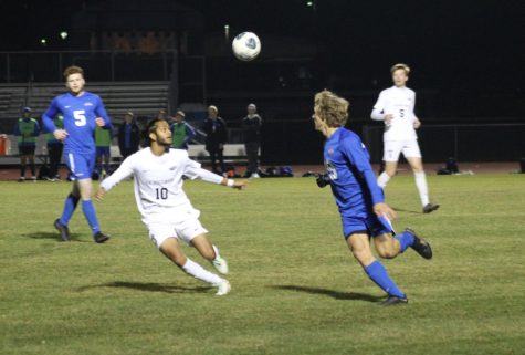 Sophomore Midfielder Faizan Mohiuddin fights for the ball to move it down the field Oct. 28th, 2022. 
