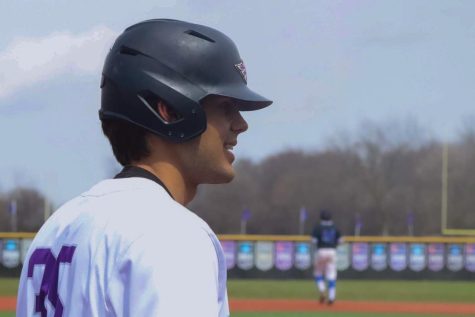 Sophomore first baseman Nick Paget (35) smiles as he looks toward his teammates during the game against Findlandia in Prucha Field Saturday afternoon April 23, 2022.
Photo by Ky McCombe
