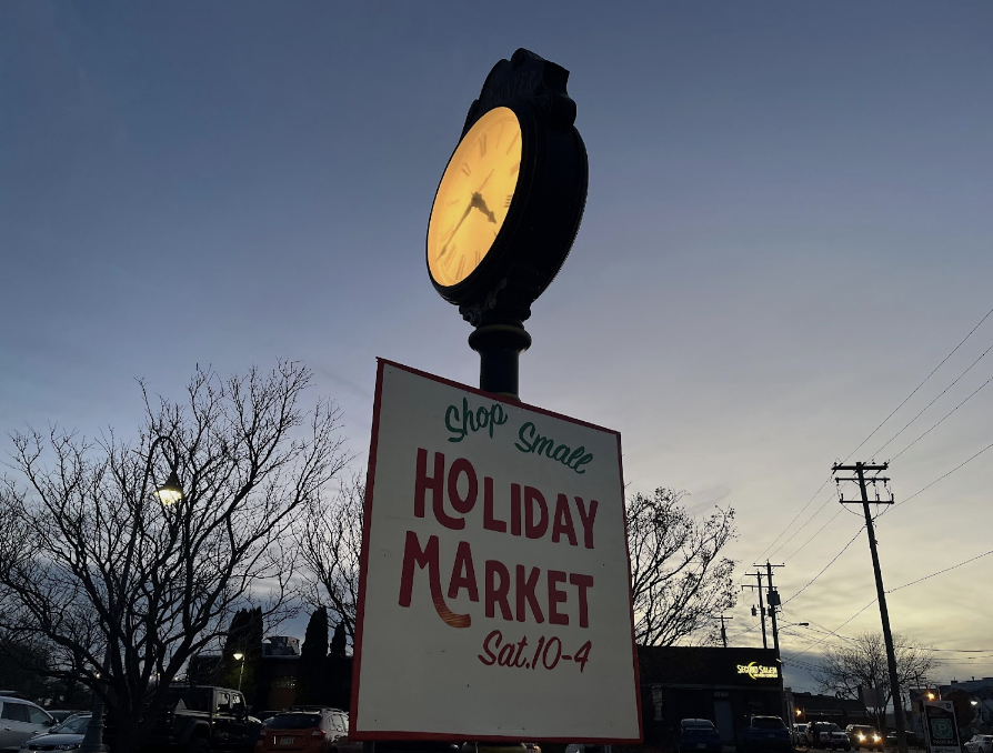 Holiday Shop Small sign near local downtown Whitewater restaurant. 





