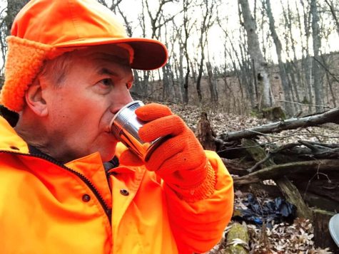 Chris Hardie takes a sip from the top of his grandfather’s Thermos during the opening day of the 2021 gun deer hunt.
