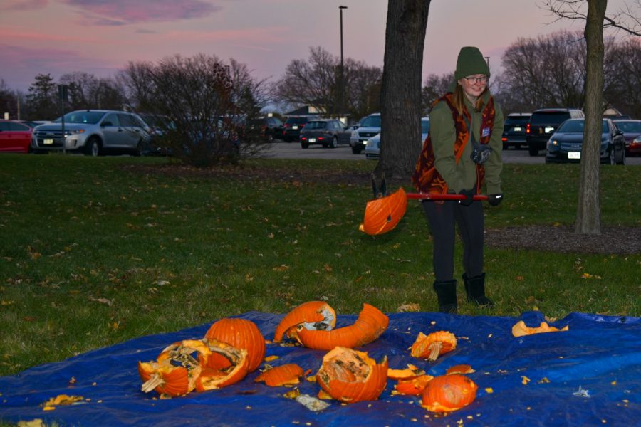 In order to compost this year’s Halloween pumpkins, Caroline French smashes them at Sustainability Office’s Fall Fest. The office holds a pumpkin smashing event yearly.