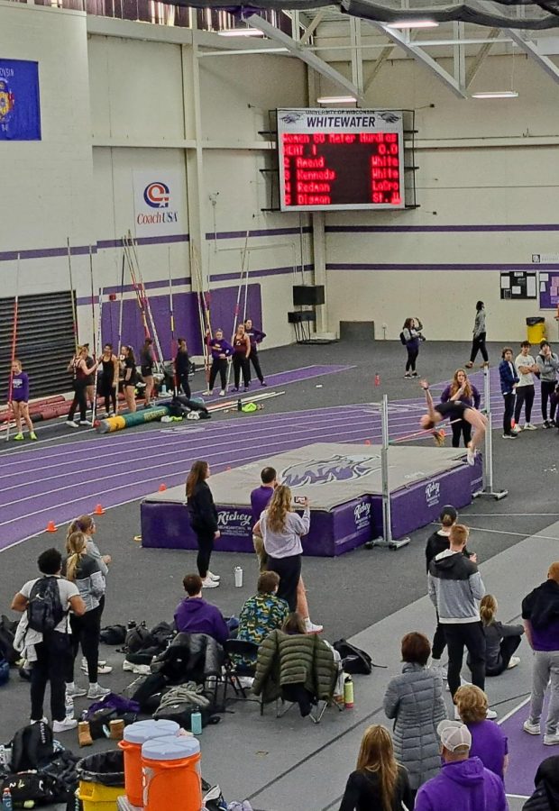 UW-Whitewaters Womens high jump athlete jumps over bar at the Squig Converse Invitational in the Kachel Fieldhouse Jan. 28th 2023.