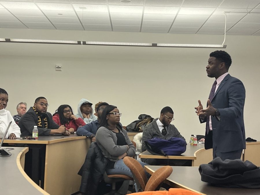 Judge Everret Mitchell speaks to Black Student Union and Psi Phi fraternity members about the importance of racial justice within the state of Wisconsin on Feb. 7, 2023.  
