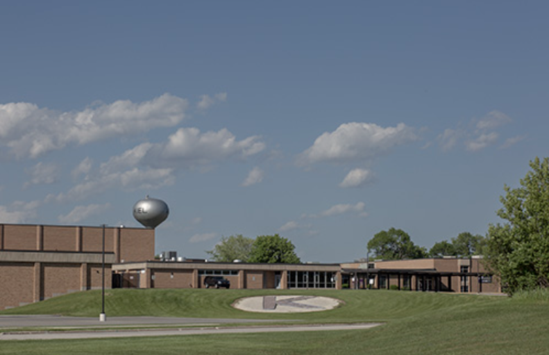 Kiel High School in Kiel, Wisconsin is shown on June 2, 2022. It was among several named targets of bomb threats in Kiel in spring 2022. The final bomb threat came with an ultimatum: Drop an investigation into the alleged bullying of a transgender student or much of Kiel would face violence. The school board abruptly closed the investigation. (Lianne Milton for Wisconsin Watch)
