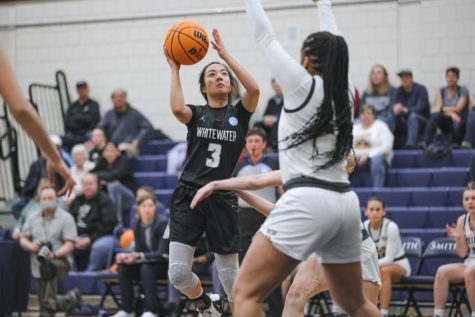 Yssa Sto. Domingo goes up against a defender for a shot near the basket in what would be the final game of her career.