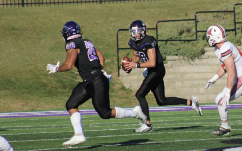 Senior Quarterback Evan Lewandowski (#10) and Sophomore Drake Martin (#28) work to advance the ball in the UW-Whitewater Vs. UW-River Falls football game Oct. 29th, 2022.
(photo Savannah Gellings)