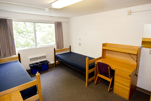 Example of a standard double room at UW-W. By May 14, all students must be moved out of their current residence halls and have all campus-issued furniture returned to where they were originally located upon fall arrival.
