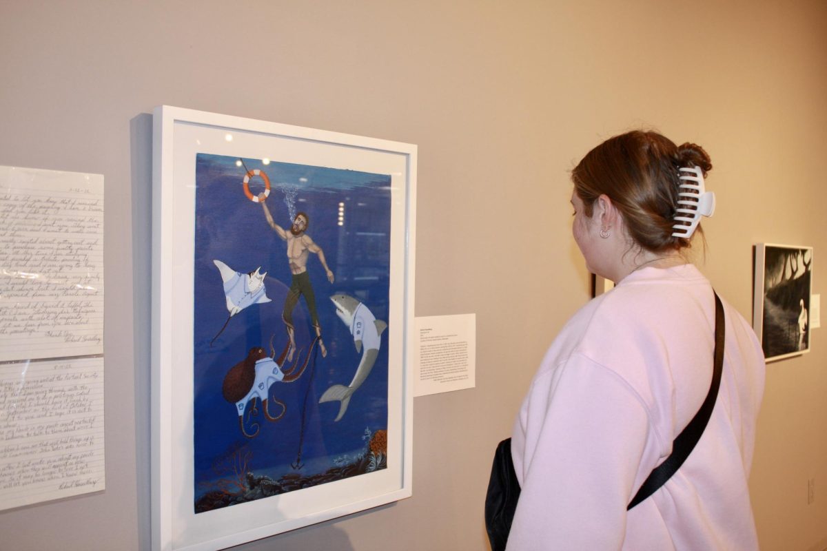 Megan Koelblinger takes the time to learn more about the art within the Crossman Gallery on September 11th for her World of The Arts class