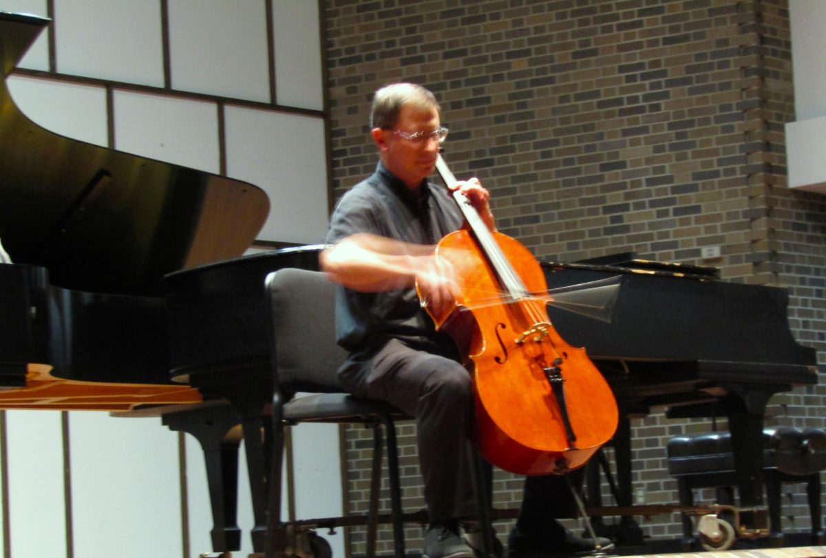 Benjamin+Whitcomb+opens+the+Music+Mosaic%E2%80%99s+Faculty+Showcase+by+playing+a+6+movement+piece+on+the+cello+in+UW-Whitewater%E2%80%99s+Light+Recital+Hall+Sept+23+2023.