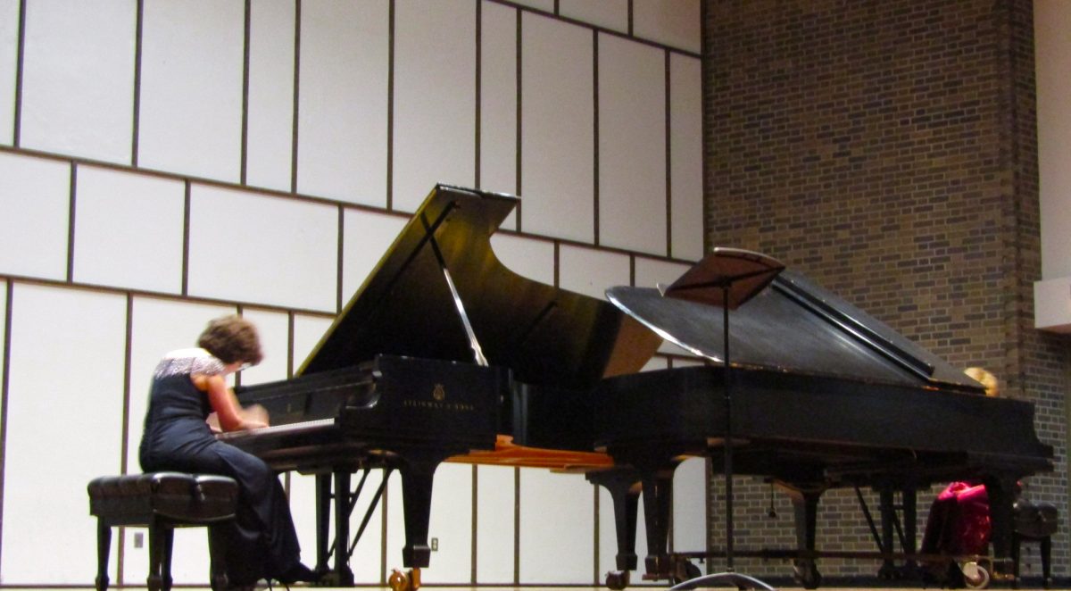 Stanislava Varshavski(Left) and Diana Shapiro(Right) both perform on pianos a piece called Variations on the Paganini’s Theme by Witold Lutoslawski for the  Music Mosaic’s Faculty Showcase in UW-Whitewater’s Light Recital Hall Sept 23 2023.