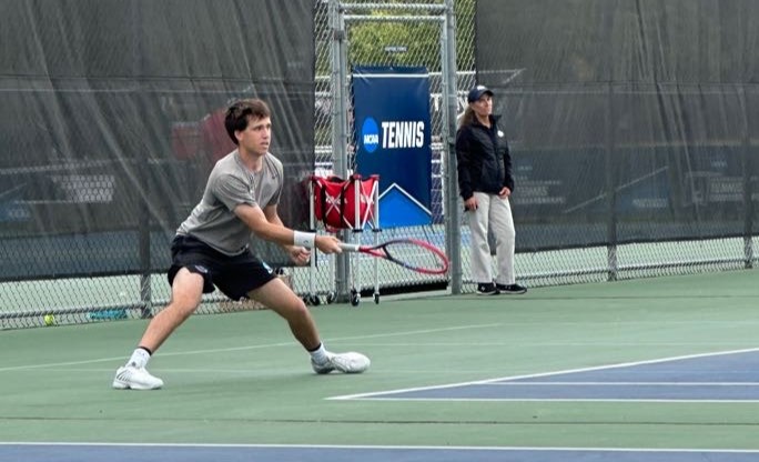 Reuben Giorgio slices a forehand while playing in the UW-Whitewater Invite.