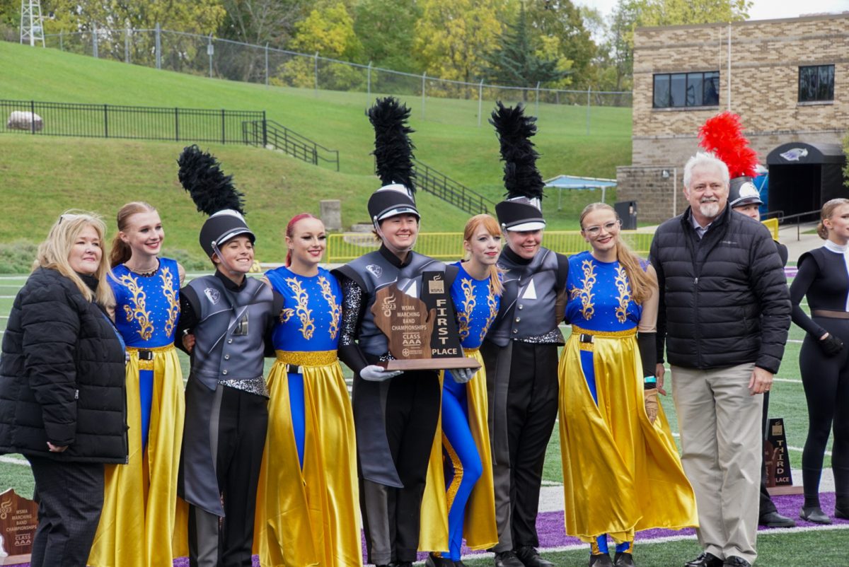 River Falls High School Marching Band accepts their 4th award of the day - first place in class AAA 