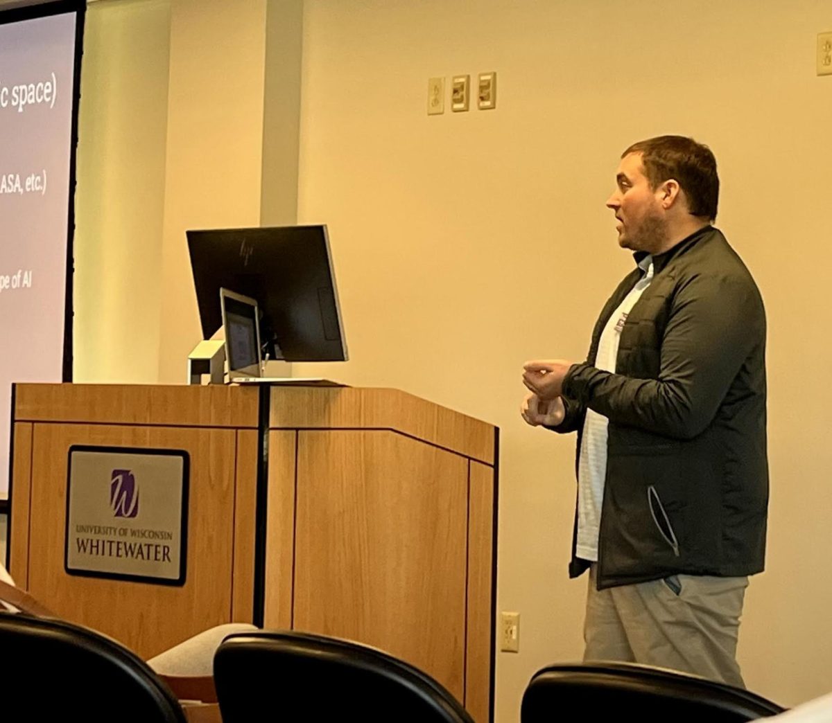 Director+of+the+learning+technology+center+Eric+Loepp+discusses+UW-Whitewater%E2%80%99s+advancements+in+artificial+intelligence+education+for+faculty++during+the+Fall+All+Faculty+meeting+on+Oct.+17%2C+2023.