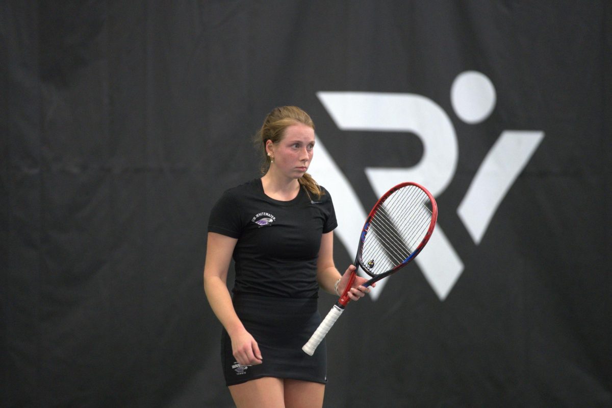 Cassie Lee holds her racquet in between points as she plays in the WIAC Championships in Nielsen Tennis Stadium in Madison, Wisconsin, on Oct. 22, 2023.
