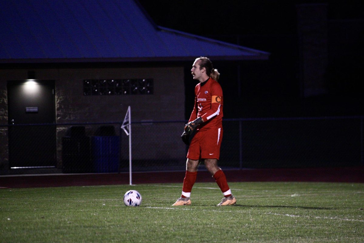Captain and goalie for the UWW men’s soccer team, #1 Duncan Morgan, takes a goal kick for the Warhawks