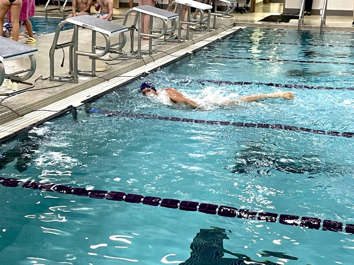 Hunter Hayberger seals victory in the 200 freestyle at the UWW swim and dive intrasquad and alumni meet to begin the season