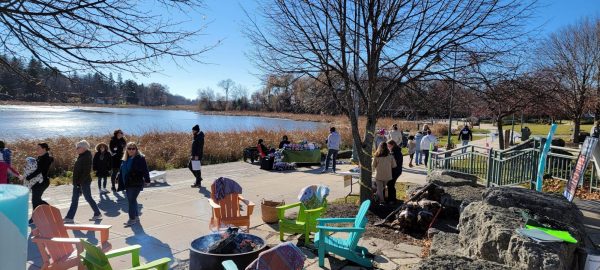 People gathered along the water to enjoy music, local businesses, food, and more at the Shop Small Holiday Market. Join in on the fun this year on November 25. Credit: Whitewater Chamber of Commerce
