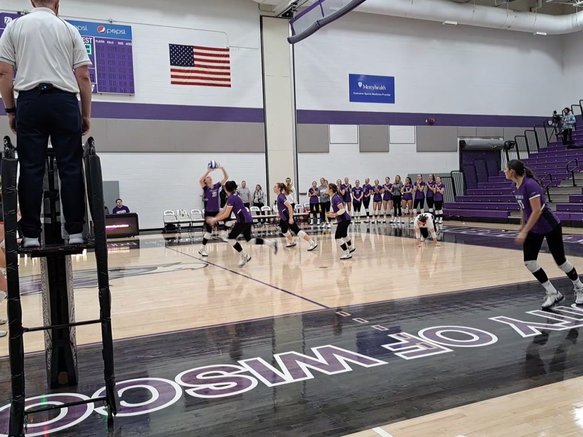 UW-Whitewater women’s volleyball player sets the ball to teammates against UW- River Falls in the UW-Whiterwater Kris Russell Volleyball Arena Nov 9 2023