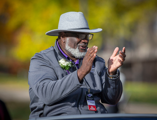 UW-Whitewater Chancellor Corey A. King claps for those along the route as he rides in the parade. Warhawks strutted on Main and Prince Streets in Whitewater in the annual Homecoming parade on Saturday, Oct. 28, 2023. (UW-Whitewater photo/Craig Schreiner)