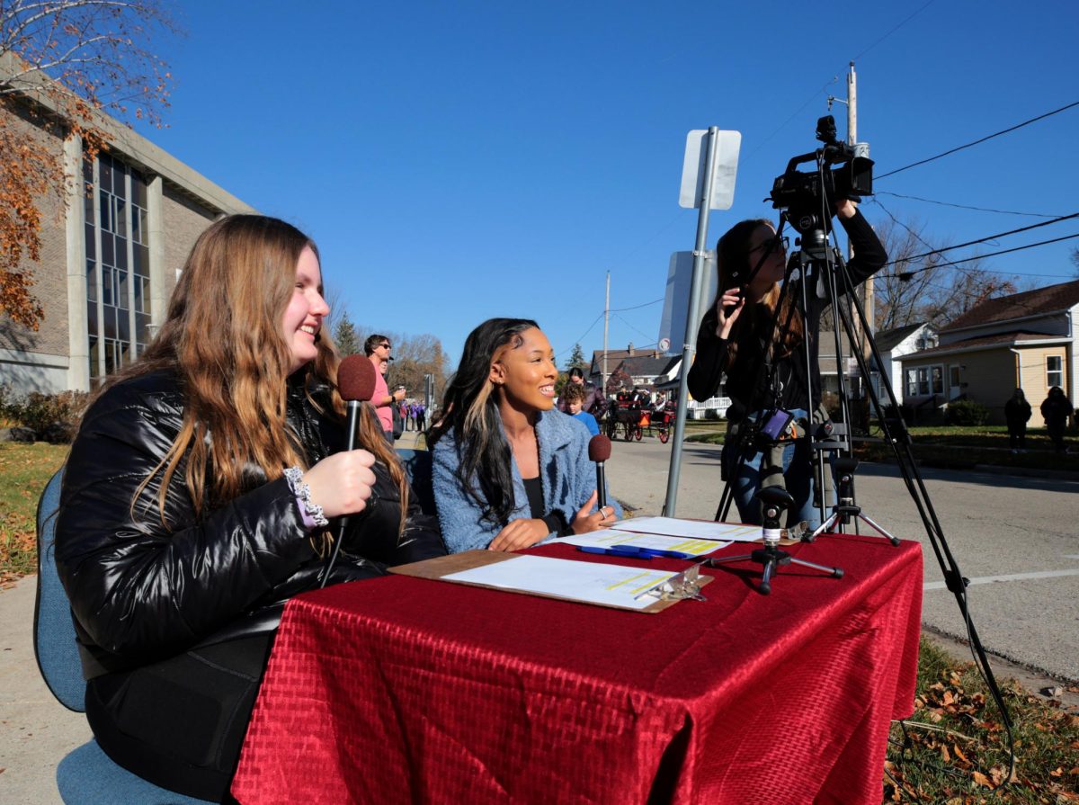 From left, students Angie Carchesi, a communication major from Franklin, Niyah Williams, a communication major from Milwaukee, and Lauren Strauss, a media arts and game development major from Polo, Illinois, cover the parade for UWWTV, the campus broadcast station. A perfect fall day greeted the UW-Whitewater Homecoming Parade on Saturday, Oct. 29, 2022, as floats, student organizations and royalty made their way along Main Street and Prairie Street in Whitewater.
