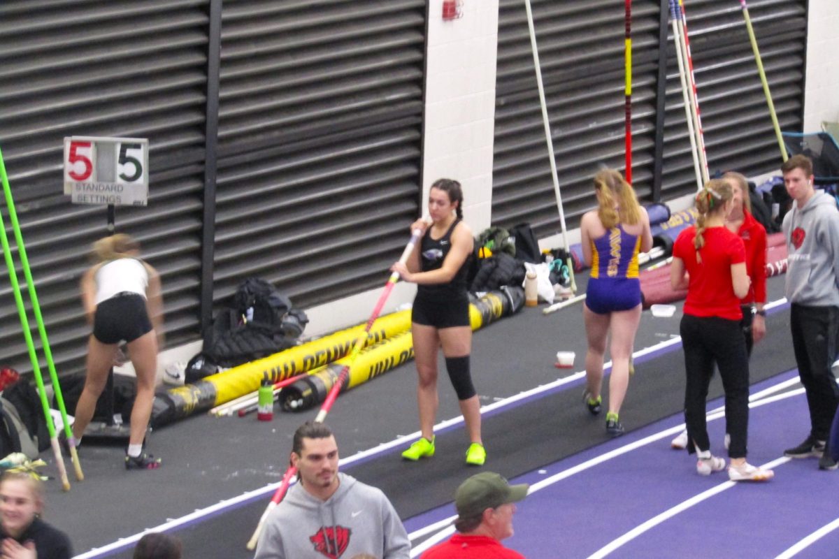 UW-Whitewater women’s track and field pole vaulter gets ready to pole vault at the Midwest Elite meet in the Kachel Fieldhouse Feb. 10 2024.