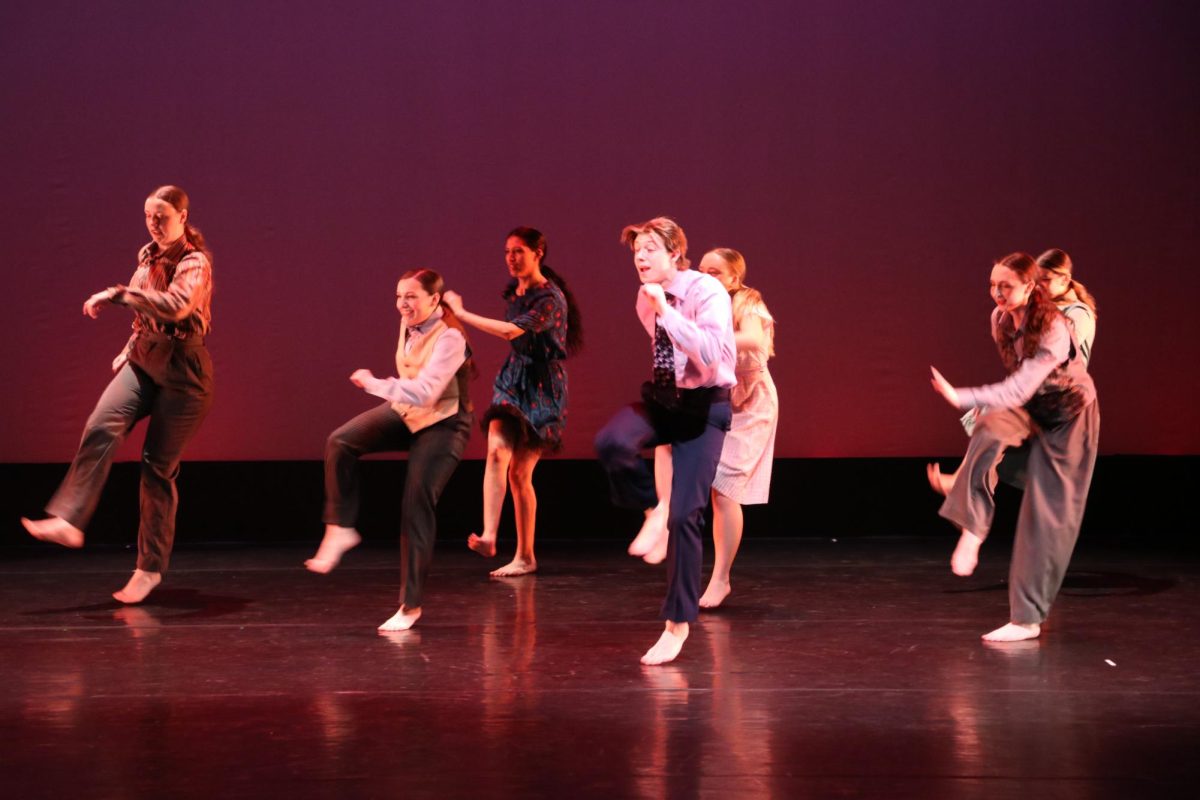  Performers kick their feet in the 2024 Dance Scapes show inside Light Recital Hall in UW-Whitewater’s Greenhill Center of the Arts, March 15, 2024.