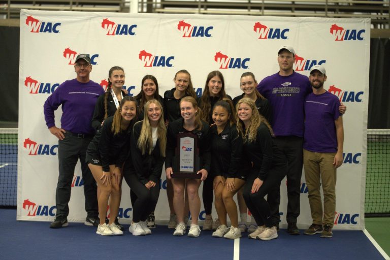 UW-Whitewater’s women’s tennis team posing with the 2023 WIAC tournament trophy Sunday, Oct. 22, 2023 at Nielsen Tennis Stadium in Madison, WI