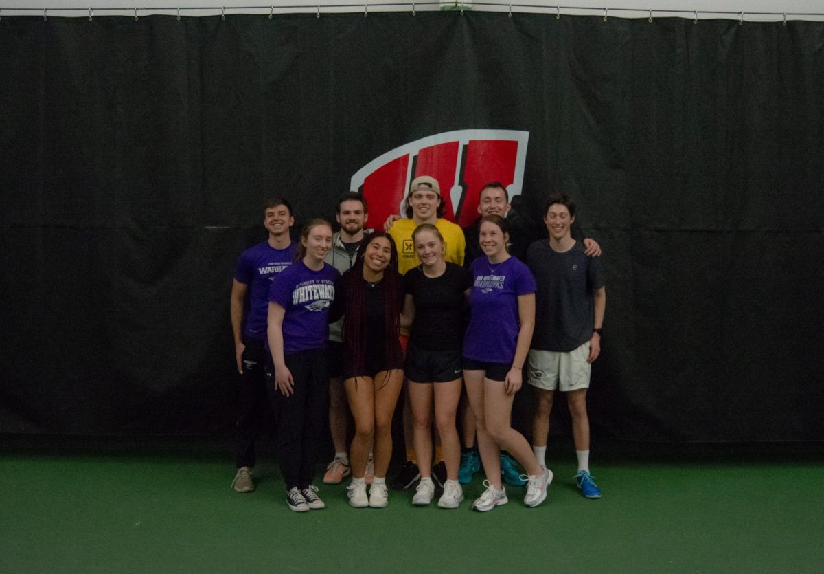 Members+of+the+Tennis+Club+at+a+game+against+UW-Madison%0A