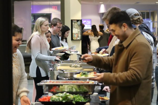The Hamilton Room fills with faculty and students alike for the 42nd annual International Dinner hosted by the International Student Association Friday evening March 8, 2024.