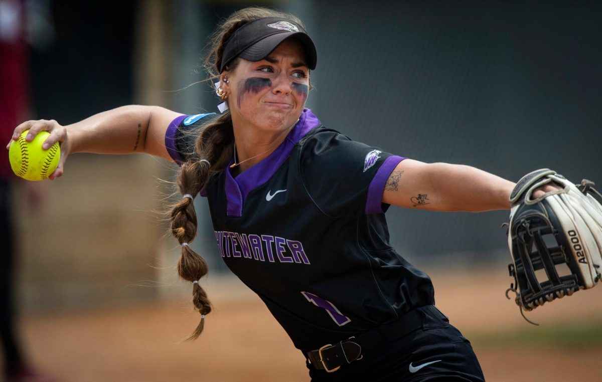 Grace+Wickman+fields+the+ball+at+third+base+and+throws+to+first+for+the+out.+The+UW-Whitewater+softball+team+advanced+in+the+NCAA+Regional+on+Friday%2C+May+19%2C+2023%2C+by+defeating+Coe+College+3-2+at+van+Steenderen+Complex.+The+Warhawks+will+play+again+at+home+on+Saturday+in+a+game+scheduled+for+11+a.m.+